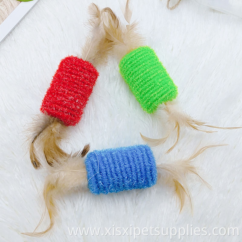Factory stock candy roller with feathers to sharpen claws Cat toys